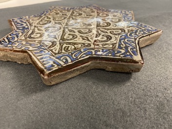 A star-shaped luster-glazed tile, Kashan, Iran, 14th C.